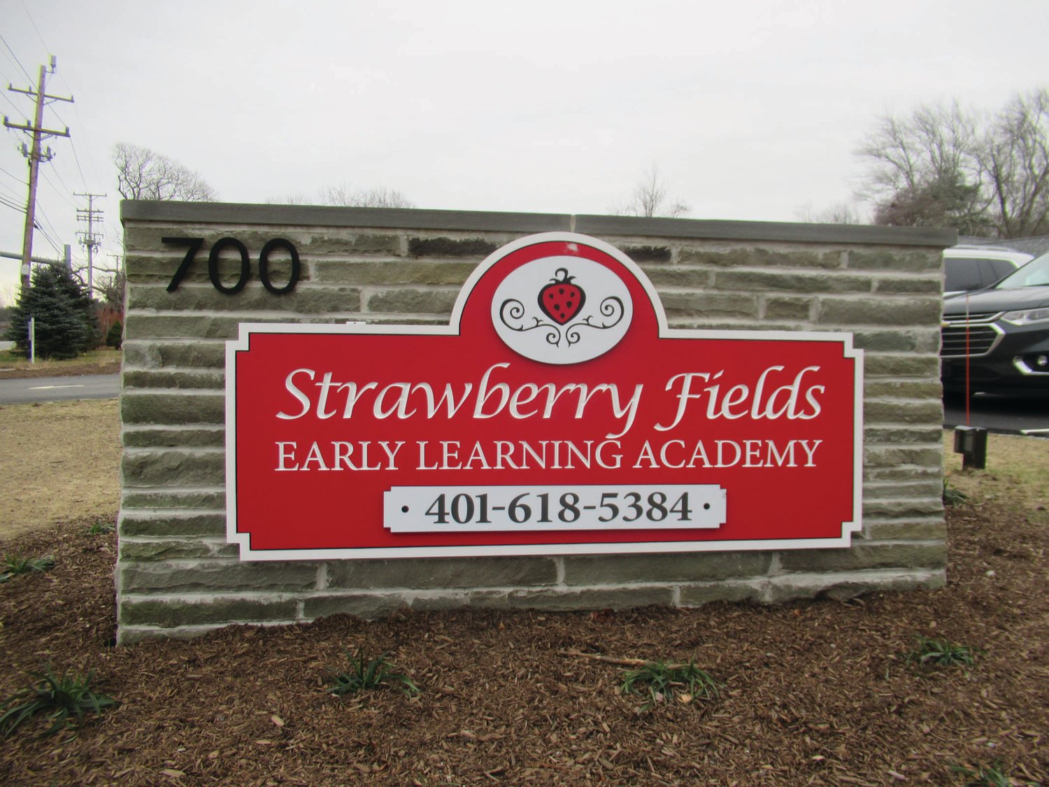 SPECIAL STONEWORK: Even the sign located on the front lawn of Strawberry Fields Early Learning Academy at 700 Greenville Avenue in Johnston was specially built for Johnston’s newest business that features seven uniquely named classrooms for children age six weeks to five years.   